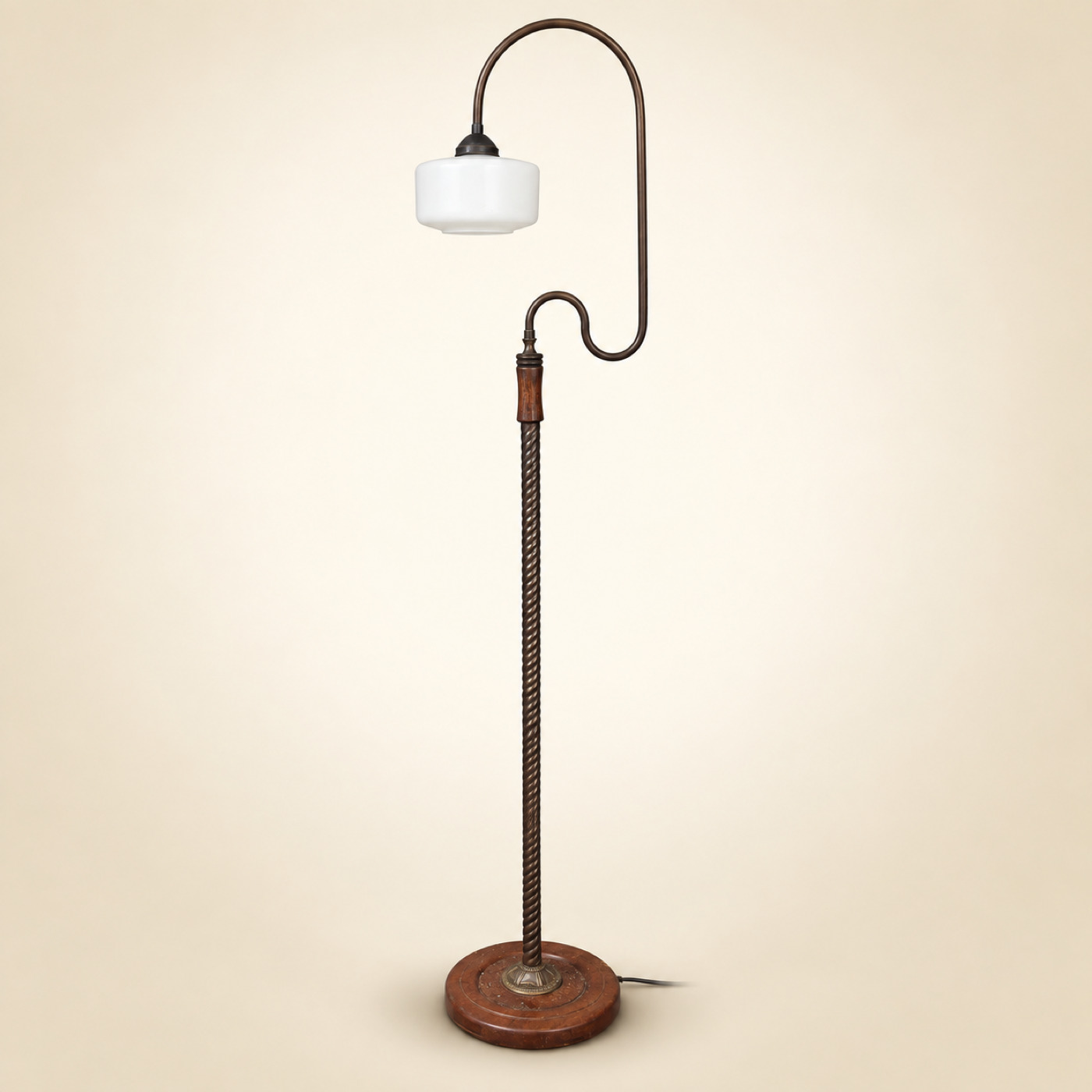 Floor Lamp with Twisted Metal Column, Looped Curved Metal Arm and White Opaline Glass Drum Shade, on a Round Wooden Base — F10 — Angle 1