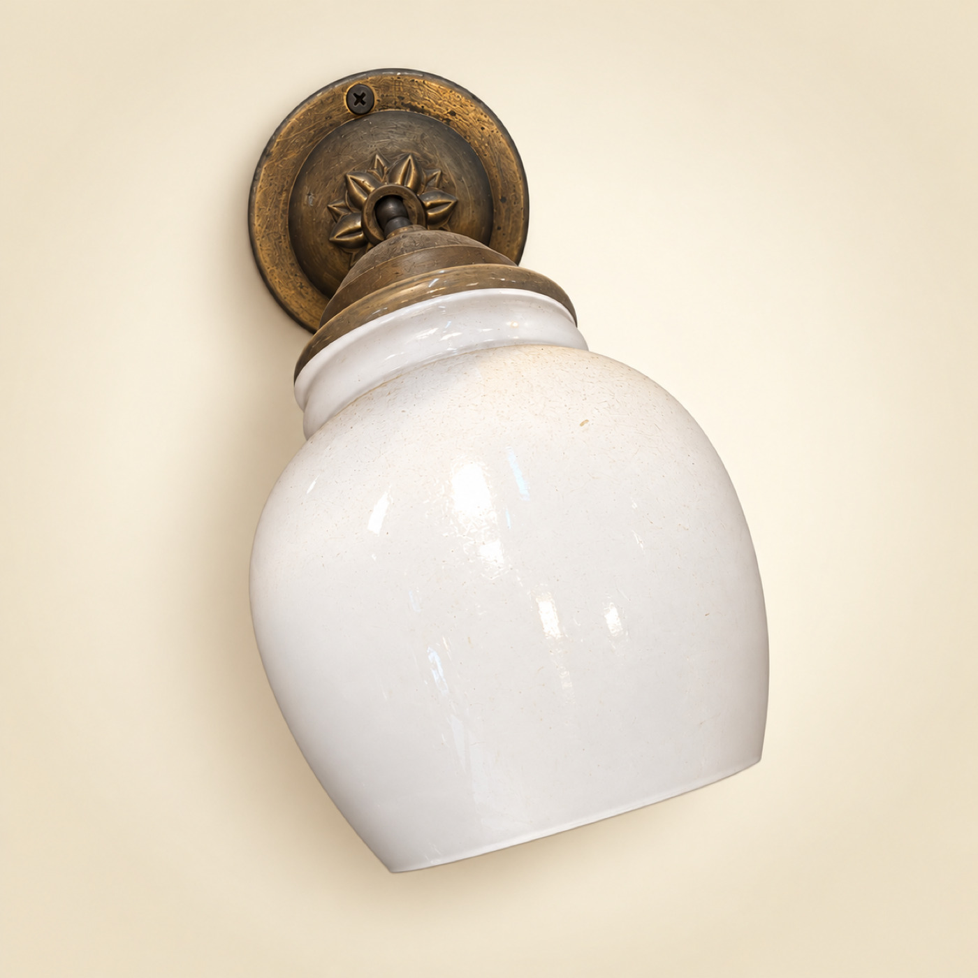 Bronze Wall Sconce with Round Star-Embossed Wall Plate and White Opaline Glass Jar Shade — K72 — Angle 1
