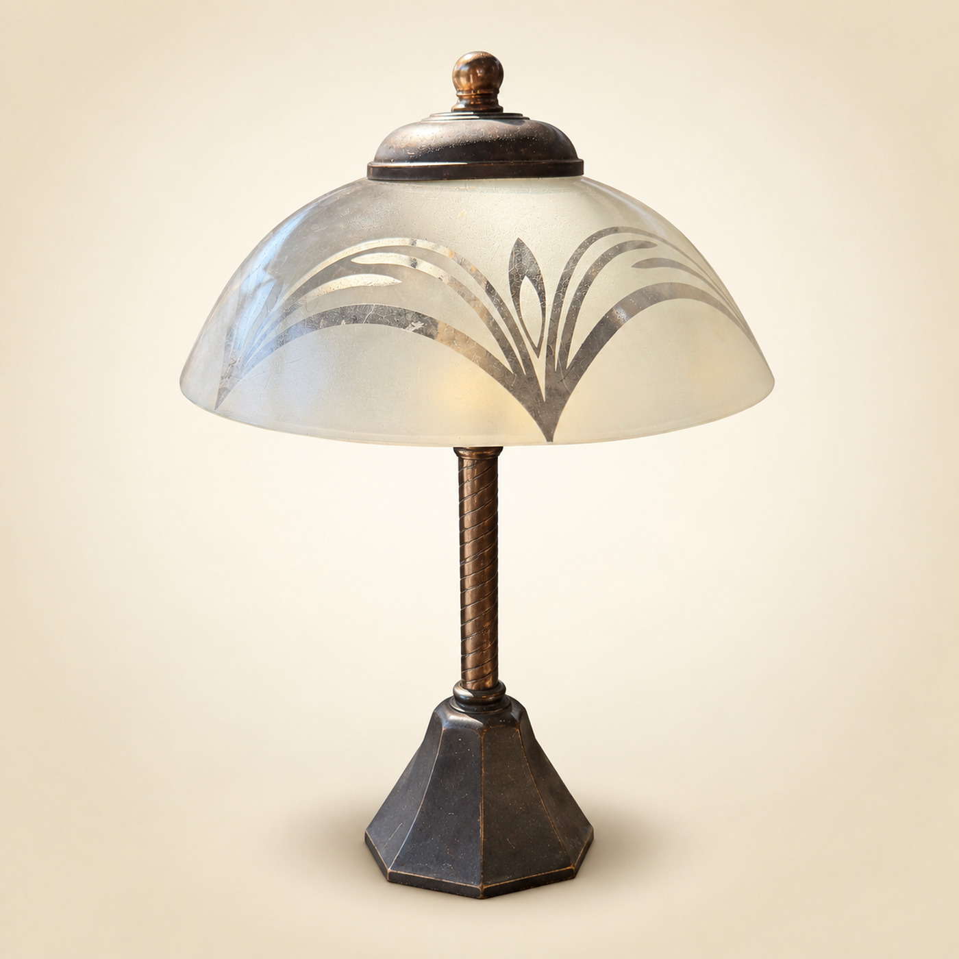 Table Lamp with Frosted Glass Dome Shade Etched in a Leaf Pattern, Bronze Cap with Finial, Twisted Stem and Dark Hexagonal Base — S150 — Angle 1