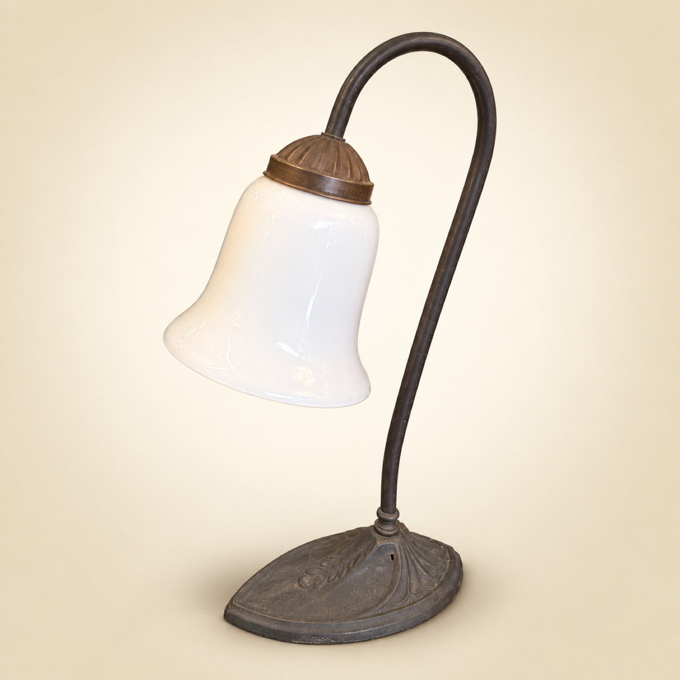 Gooseneck Table Lamp with Dark Metal Arm, White Opaline Glass Bell Shade and Fluted Brass Cap, on a Leaf-Shaped Cast Base — S91 — Angle 1